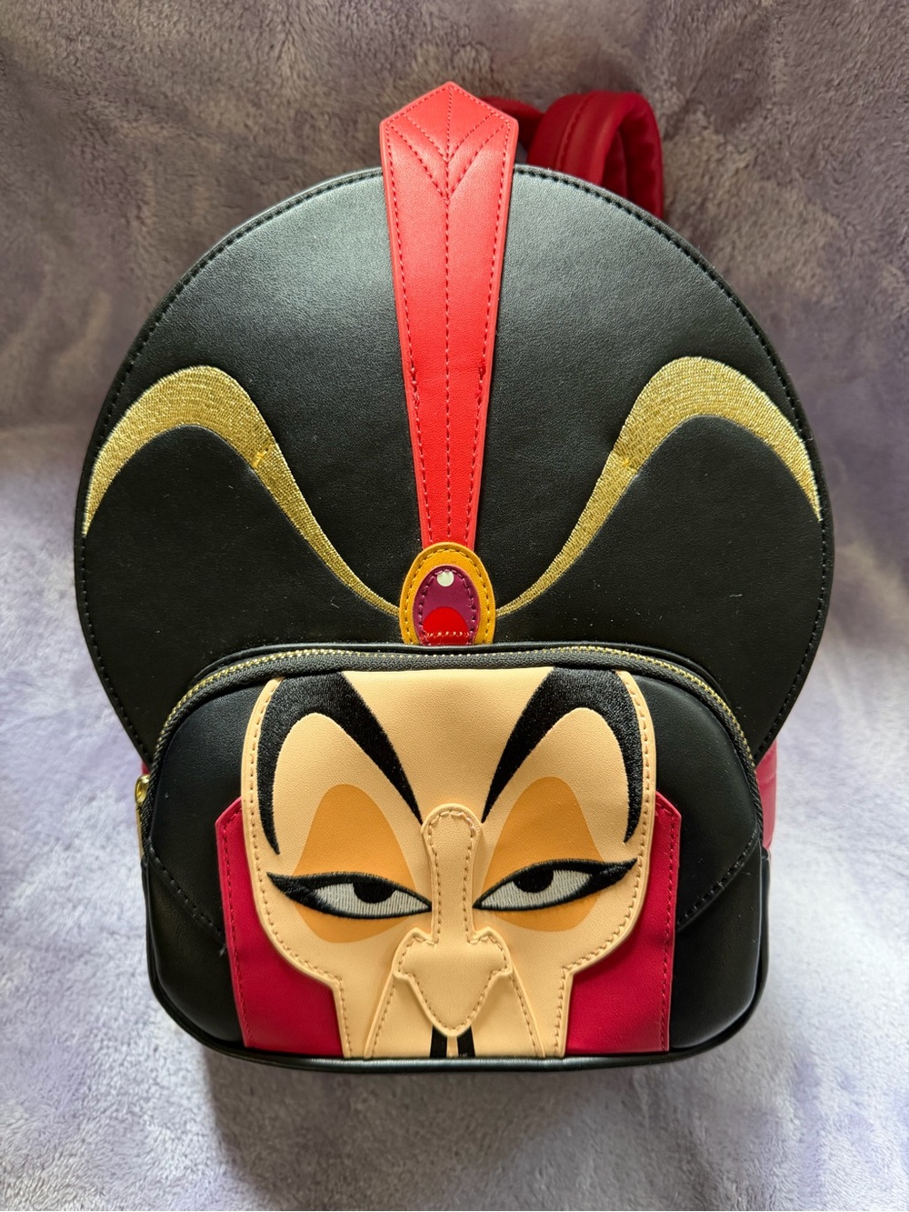 Novelty Black & Red Villain Face Mini Backpack.        New with tags.